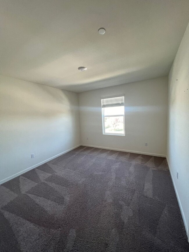 Building Photo - Welcome to modern living in a secure, gated community!