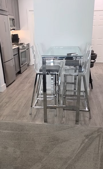 dining table and four chairs - 27 Booth St