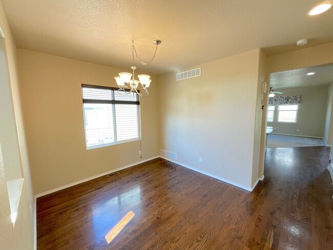 Building Photo - 4 Bedroom Home Available Near Voyager Pkwy...