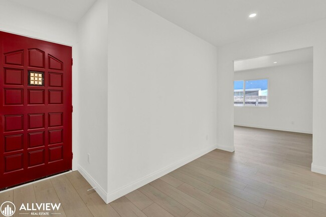 Building Photo - Fully Renovated 4-Bedroom Home with Firepl...