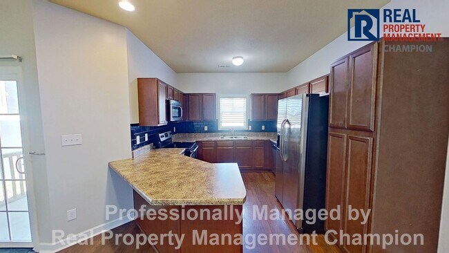 Building Photo - Beautiful Two-Story Townhome with Attached...
