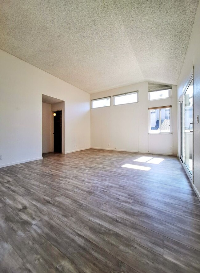 Building Photo - Spacious Two-Story 3bd Townhouse With Private Patios, Balcony, & Garage