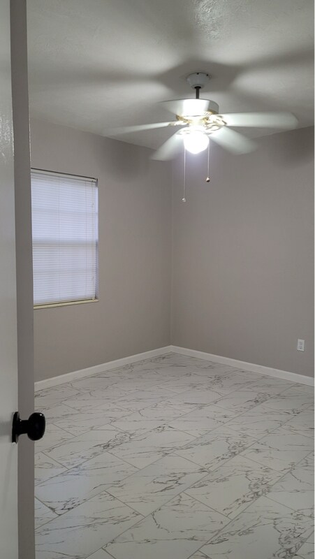 Building Photo - 7115 N Tampania Ave