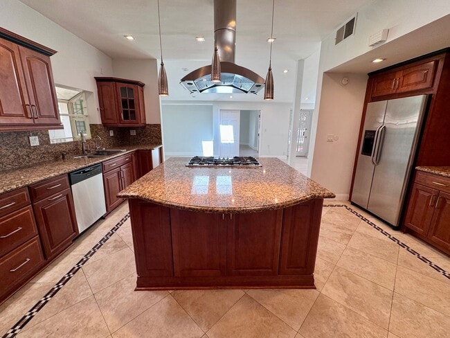 Building Photo - Beautifully remodeled 4 bedroom house in prime Woodland Hills Neighborhood