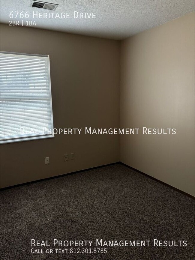 Building Photo - 6766 Heritage Dr