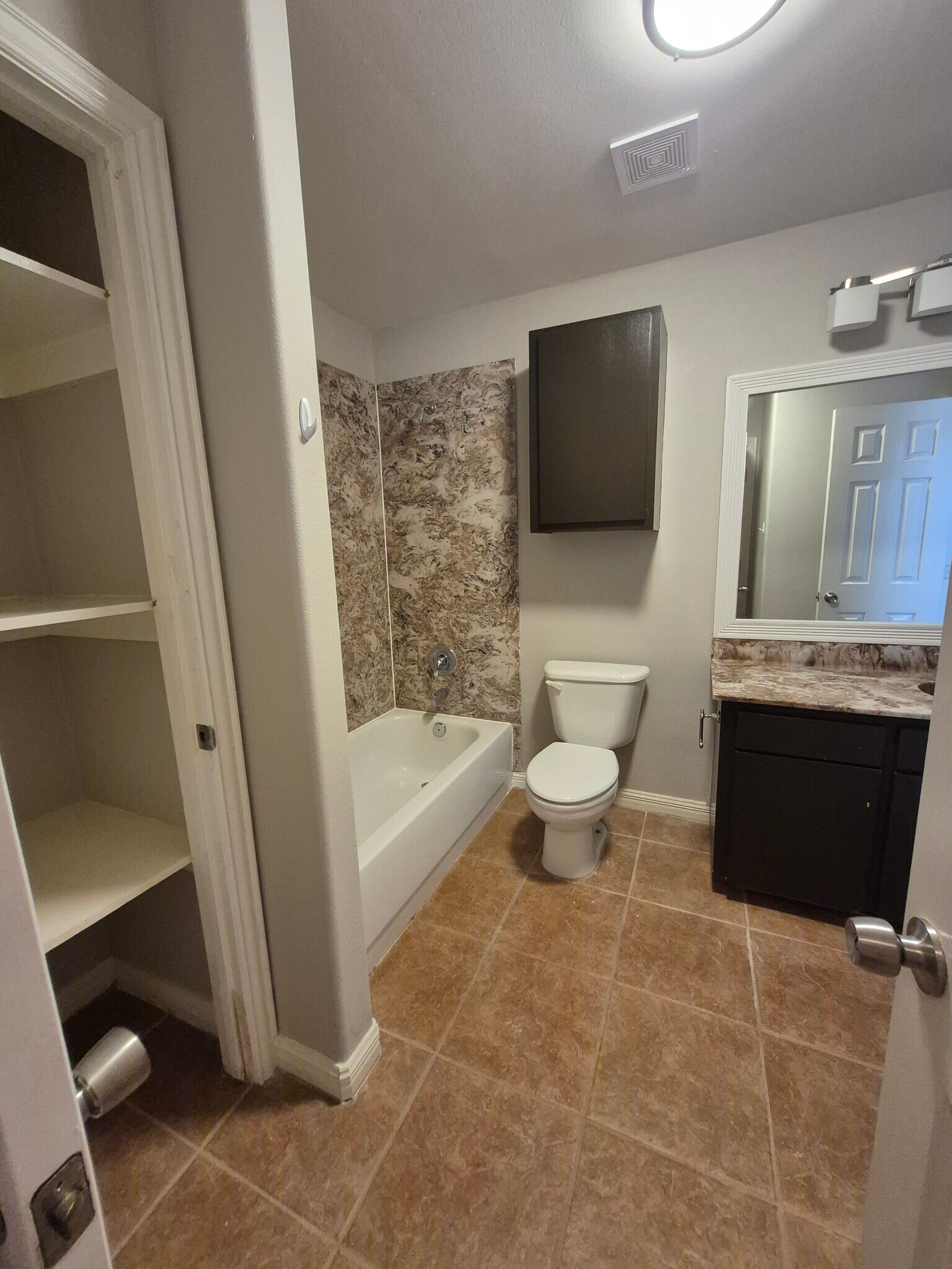 Kids bathroom but access through hallway for guest. - 617 DFW Dr