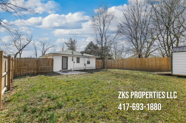 Back Yard with Concrete Patio - 2903 W Olive St