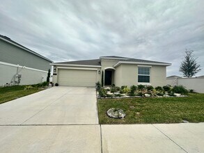 Building Photo - Brand New 4 bed inCypress Park - Haines City