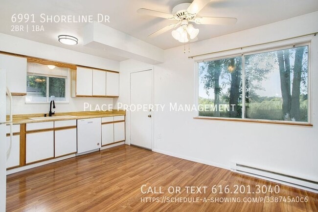 Building Photo - 6991 Shoreline Dr