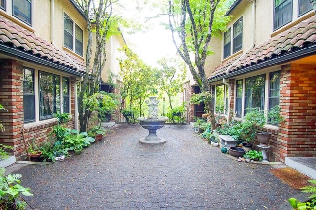 Building Photo - Amazing Vintage Tile, Arched Doorways, Built-ins & Courtyard in This Art-Deco Townhouse!