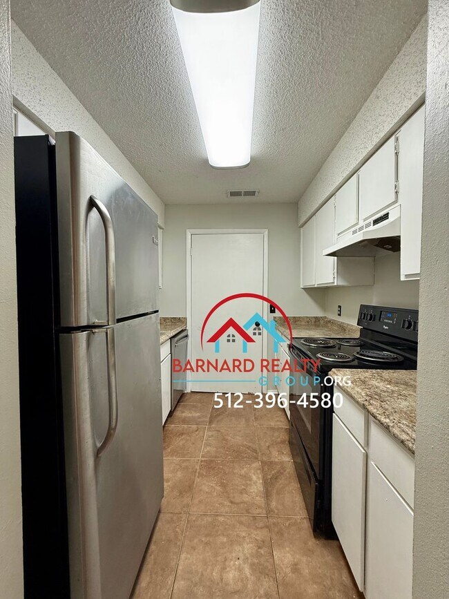 Building Photo - Available NOW: Majority of Utilities Paid and STEPS away from Campus