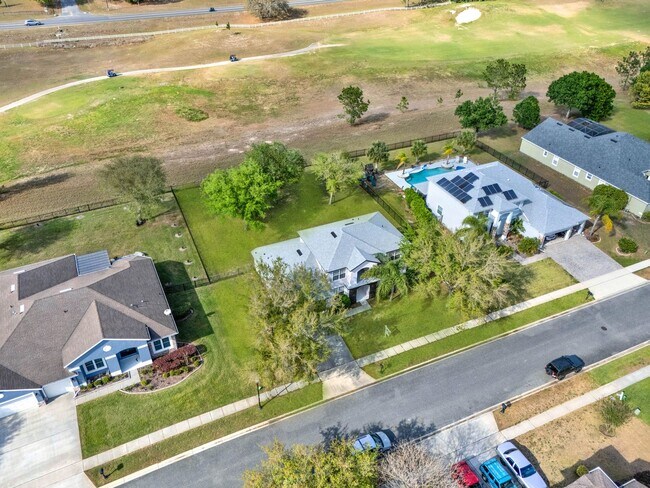 Building Photo - RENOVATED 5 BEDROOM FENCED IN, GOLF FRONTA...