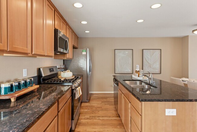 Building Photo - 4BR + Den Greenwood Home with Private Suite & 2-Car Garage