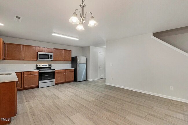 Building Photo - Earn Wealth While Leasing - Like a Homeown...