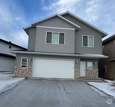 Building Photo - 4-bedroom, 3-bathroom South Fargo Single-F...