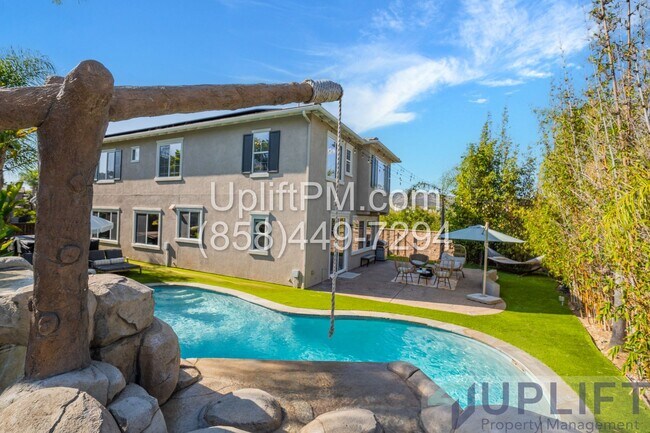 Building Photo - Spacious 5-Bedroom Home with Pool & Spa in...