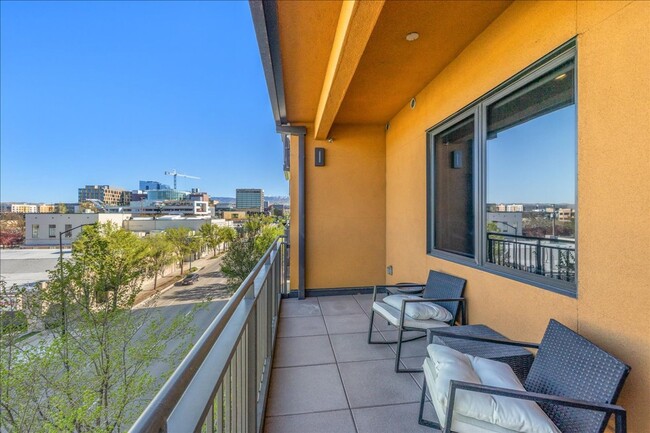 Building Photo - COME HOME TO REFINED DOWNTOWN LUXURY CONDO...