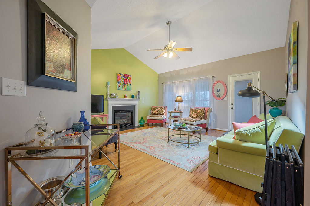 Living room with vaulted ceiling and fireplace - 2412 Laurel Falls Ln