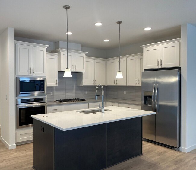 Building Photo - NEWER CONSTRUCTION! Beautiful Brand Home Backs to Greenspace! Gourmet Kitchen, Open Landing, Fenc...