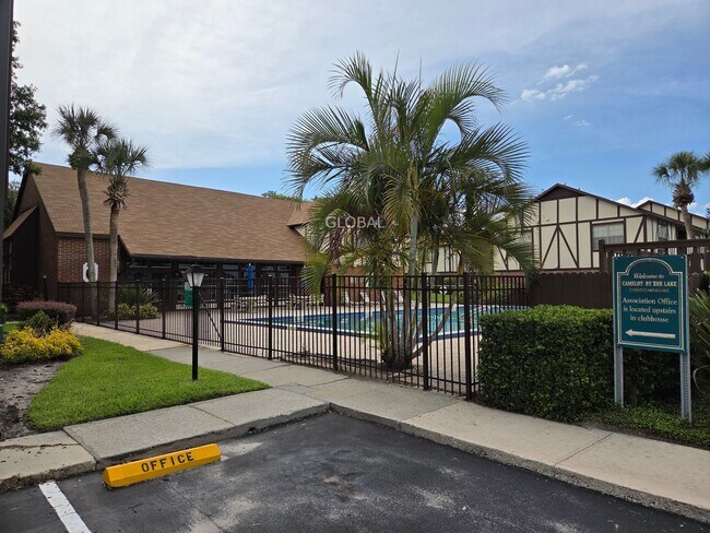 Building Photo - Lakefront First-Floor Condo in Camelot by ...