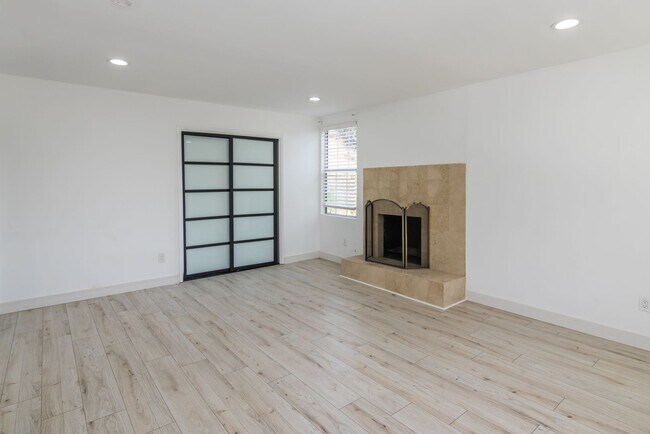 Building Photo - Refreshed 5-bedroom, 3-bathroom home locat...