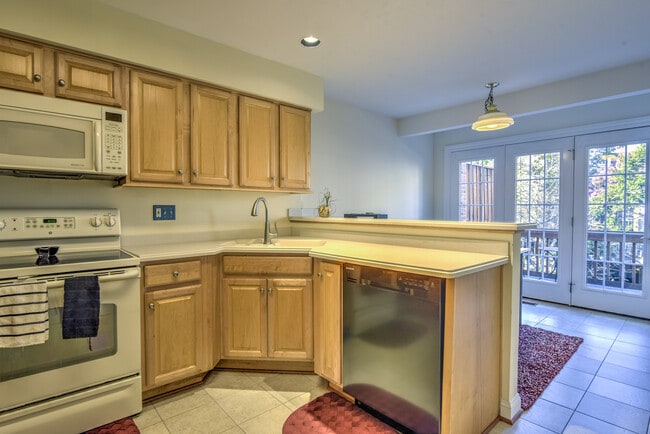 Kitchen into Breakfast Area - 6506 Serenade Plz