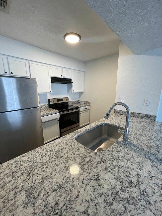 Kitchen Island View - The Cliffside Apartments