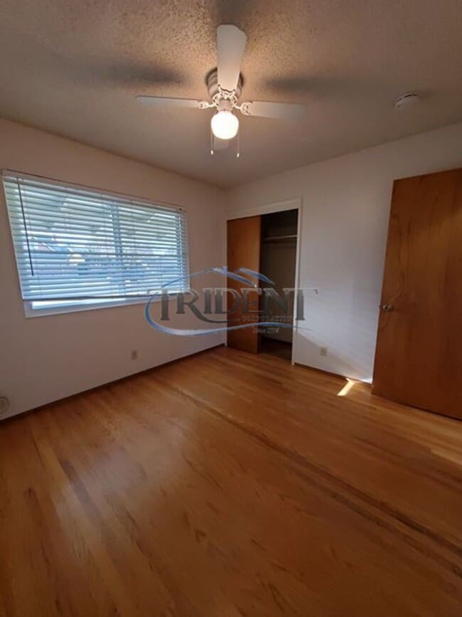 Building Photo - This is a cute 4 bedroom, 2 bath house in an established Woodland community