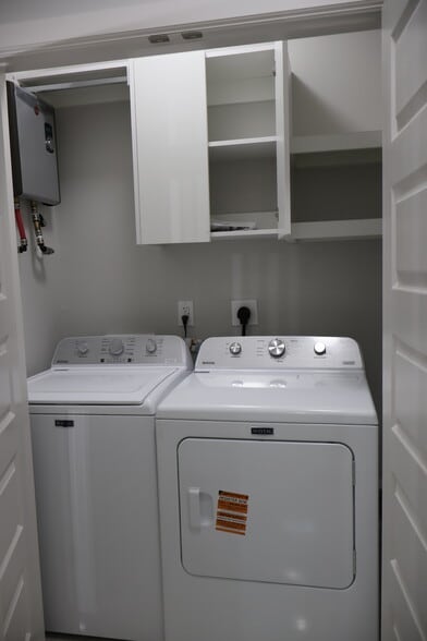 laundry with shelving - 1005 Hidden Hills St