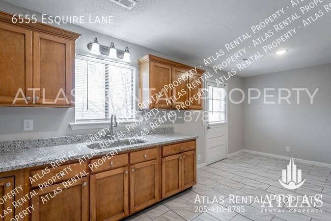 Building Photo - 6555 Esquire Ln