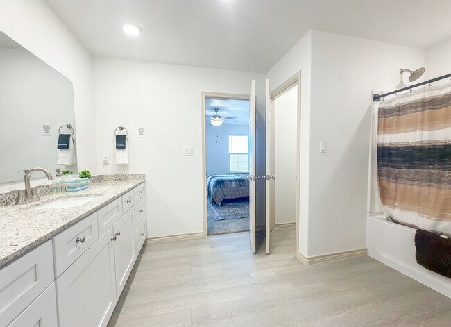 Building Photo - The Perfect Blend of Function and Luxury