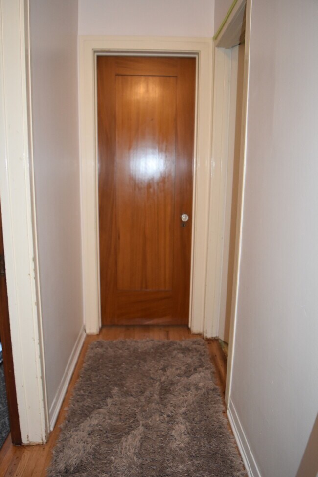 Hallway and Door to Back Bedroom - 423 S Indiana St