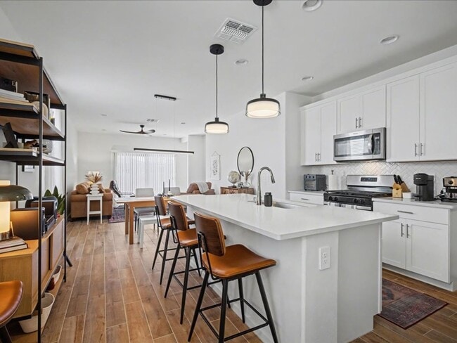Building Photo - Spacious 4-Bedroom Home with Modern Features & EV Charging!
