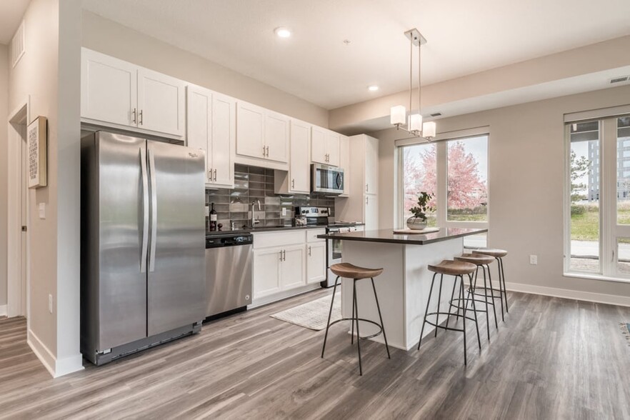 Our kitchens combine functionality and style with plenty of storage and modern appliances to enhance your culinary experience. - The Preserve at Normandale Lake