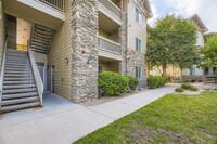 Building Photo - Bright and open three bedroom condo in exc...