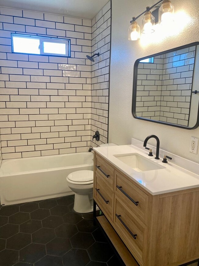 Building Photo - Three Bedroom One bath home Available now