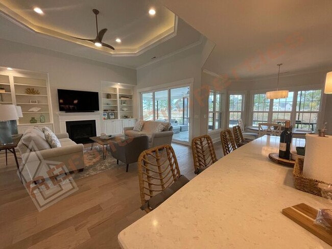 Building Photo - Stunning 4-Bedroom, 4.5-Bath Home with Pri...