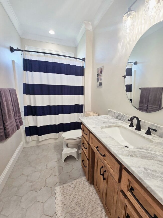 Building Photo - Spacious 4BR/3BA Home with Open Floor Plan, Screened Porch & Fenced Backyard