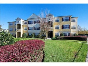 Building Photo - 2 bed 2 bath w den condo GATED Community