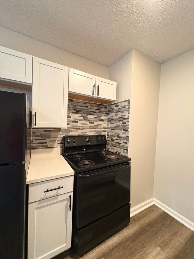 Building Photo - Live in Style without Breaking the Bank at Magnolias Living Apartments Washer & dryer in-unit