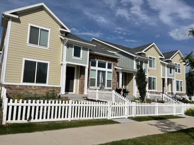 Building Photo - Pet Friendly Gorgeous Row End Townhome w 2 car attached garage!