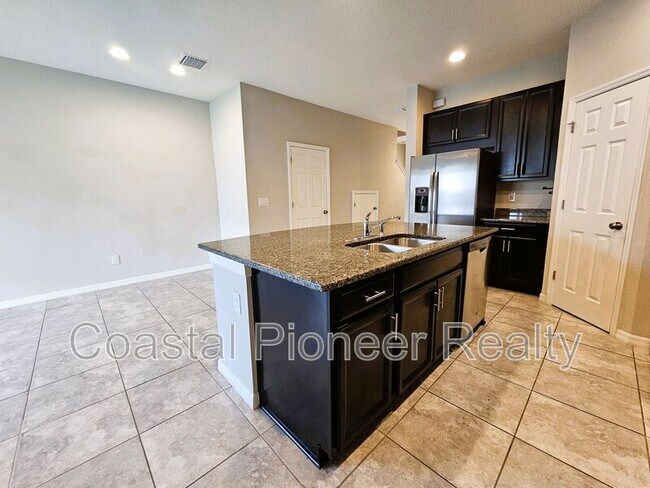 Building Photo - 7115 Grand Elm Dr