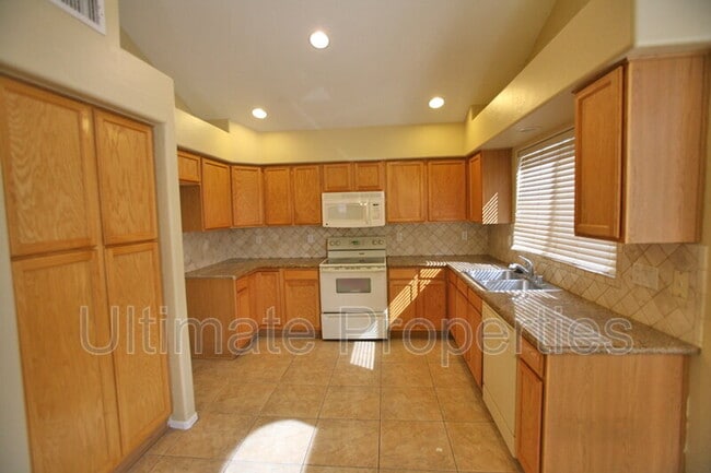 Building Photo - 6345 W Rowel Rd