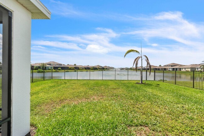 Building Photo - Spacious 5-Bedroom Home with Resort-Style ...