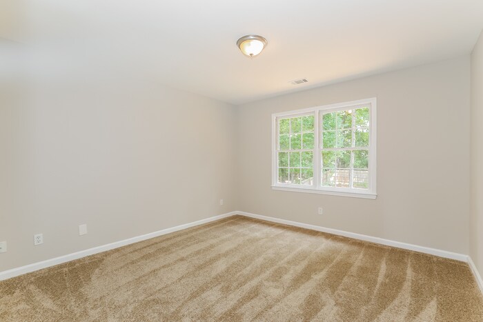 Building Photo - 1702 Woodstone Cove SE