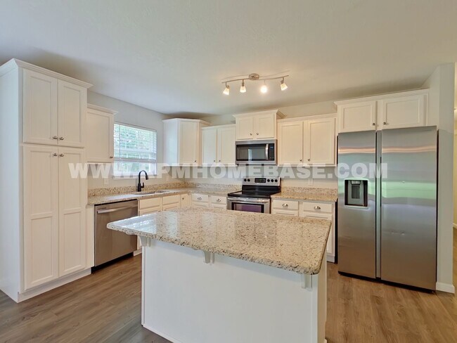 Building Photo - Your Baker Sanctuary with Spacious Backyar...