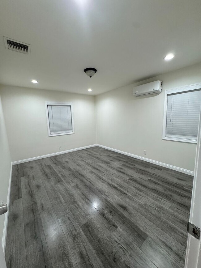 Building Photo - Home with a Cabin Style Family room and backyard Oasis