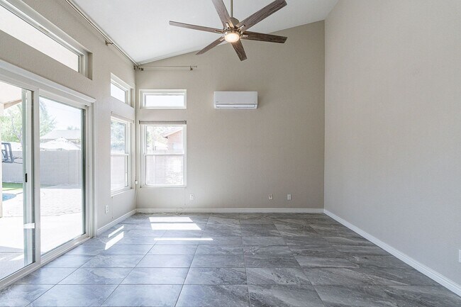 Building Photo - Charming 4-Bedroom Home with Luxurious Poo...