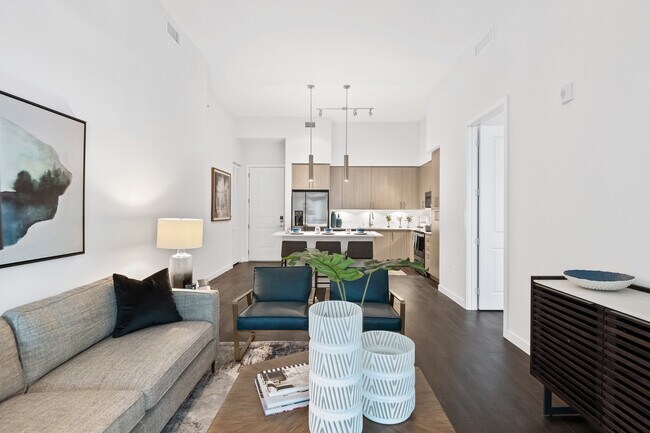 Kitchen, living, and dining areas with hard-surface vinyl plank flooring - Avalon Fort Lauderdale