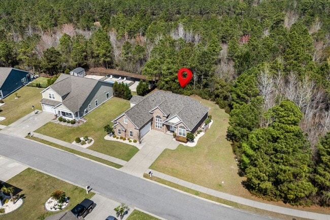 Building Photo - Spacious 4BR/3BA Home in Myrtle Beach – 2,550 Sq Ft & Screened Porch